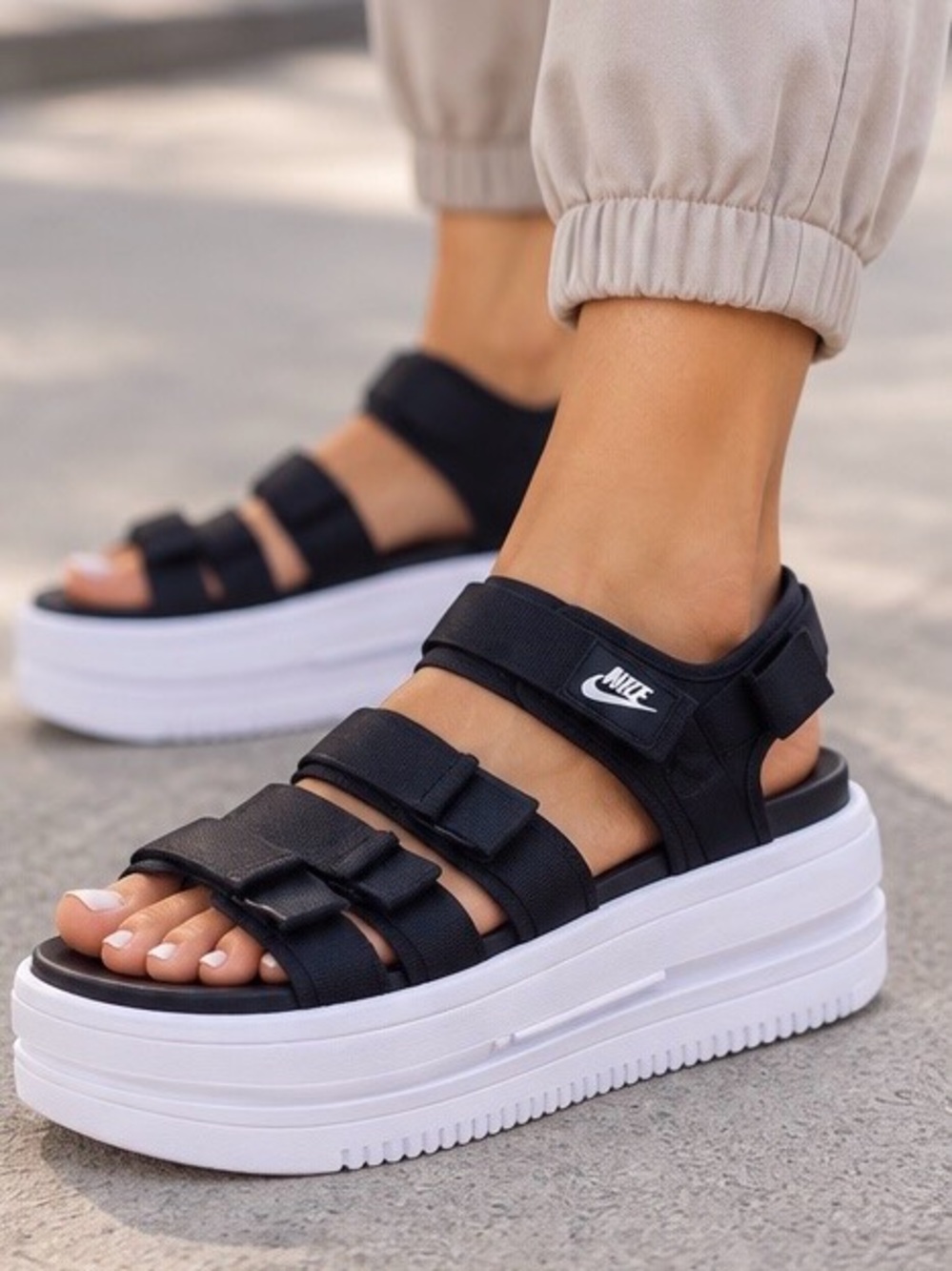 Nike Black and White Women’s Platform Sandals